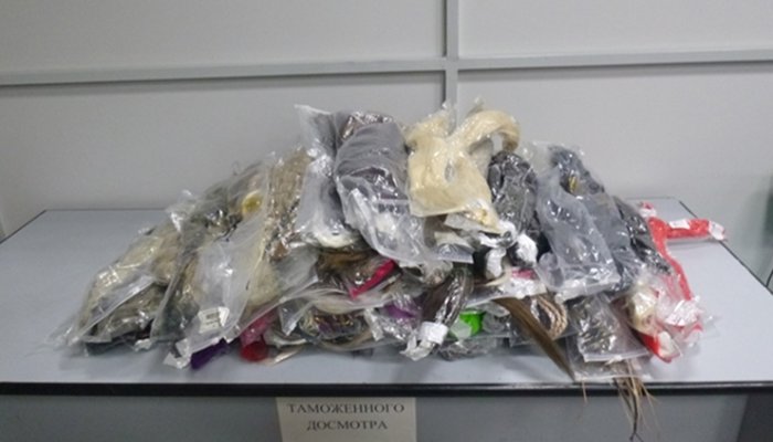 Жительница Братска незаконно пыталась провезти из-за границы 20 килограммов волос
