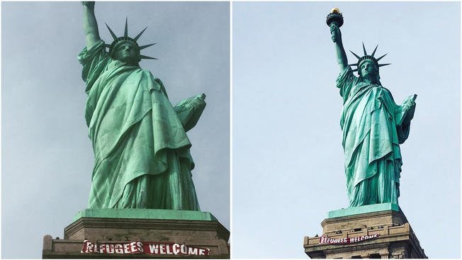 На Статуе Свободы в Нью-Йорке повесили растяжку в поддержку беженцев‍