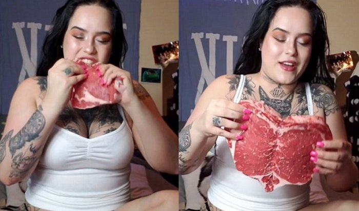 Праздник к нам приходит: американка съела огромный кусок сырого мяса в виде сердца (Видео)